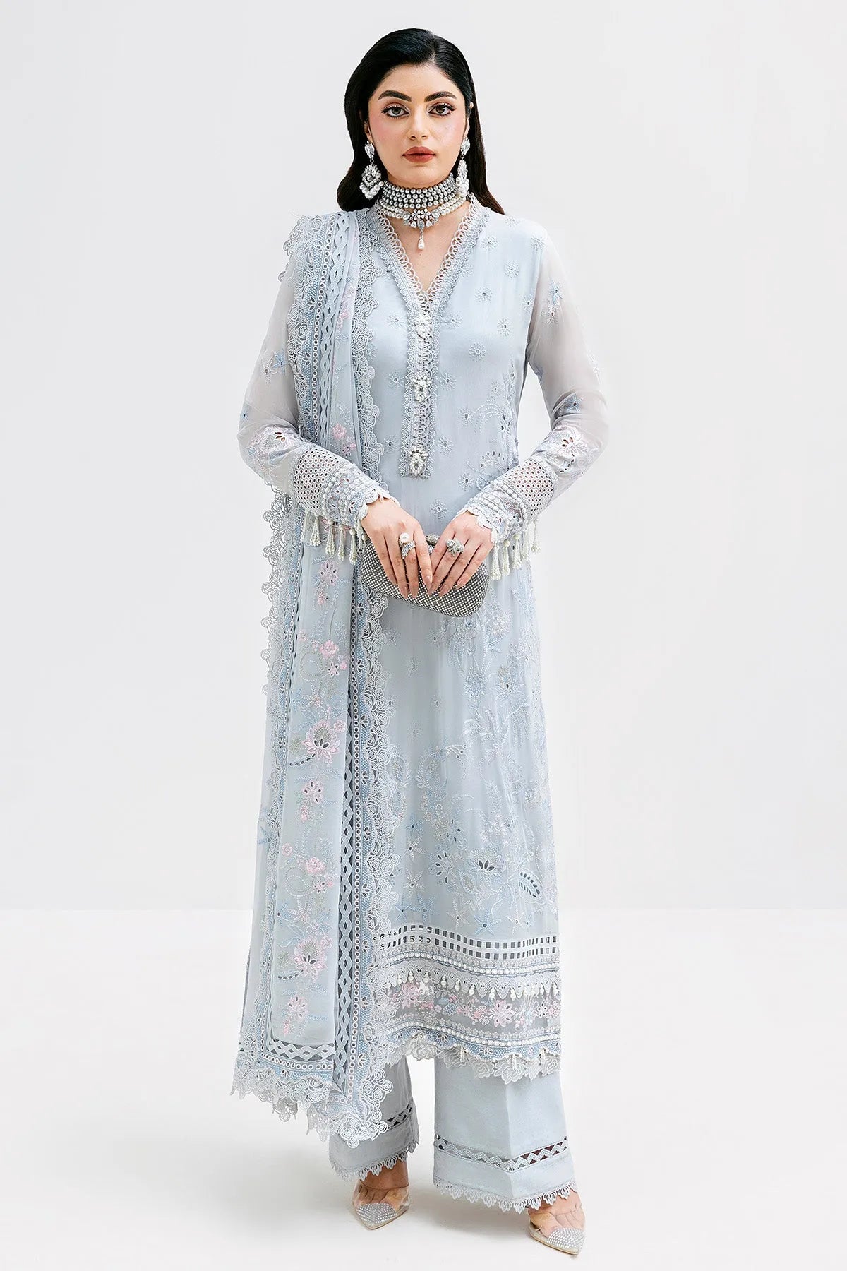 Imrozia Serene 3 piece unstitched suit in grey with intricate design, featuring fabric swatches and detailed stitching.